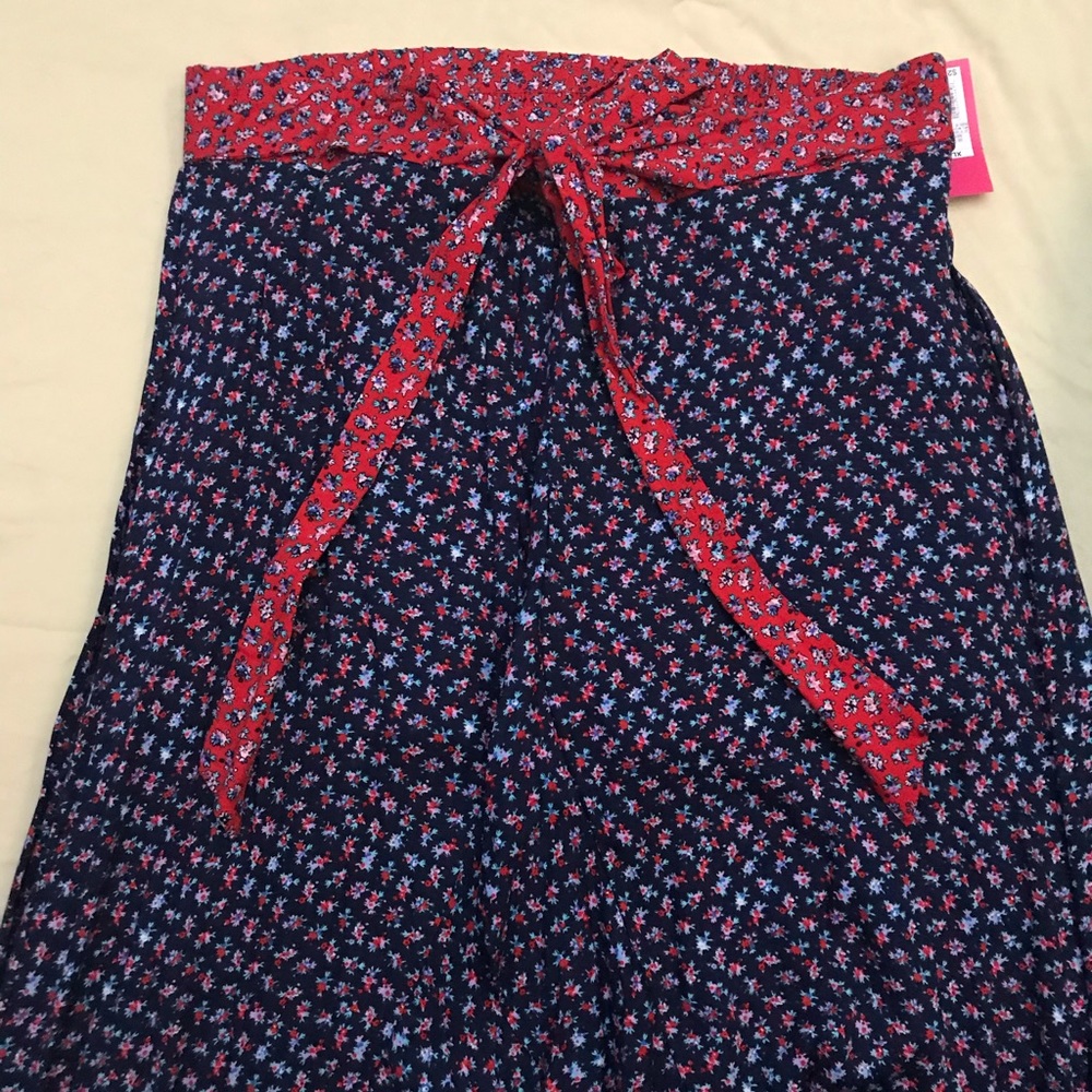 Long skirt, opens in front to reveal shorts